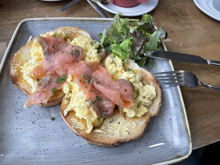 Scrambled egg and smoked salmon on toasted sourdough